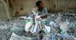 haitian child lays with general election ballots